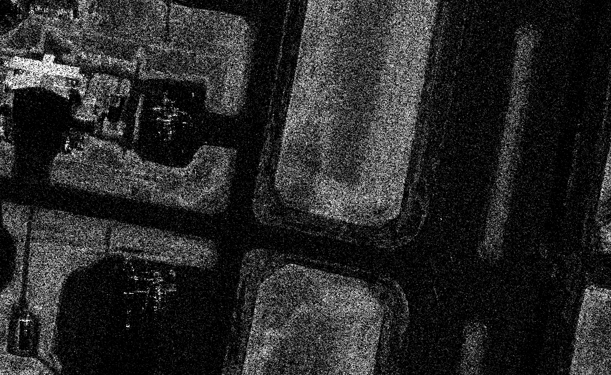 SAR image of Joint Base Elmendorf–Richardson area at 1 look; broad scene context with higher speckle and lower clarity.