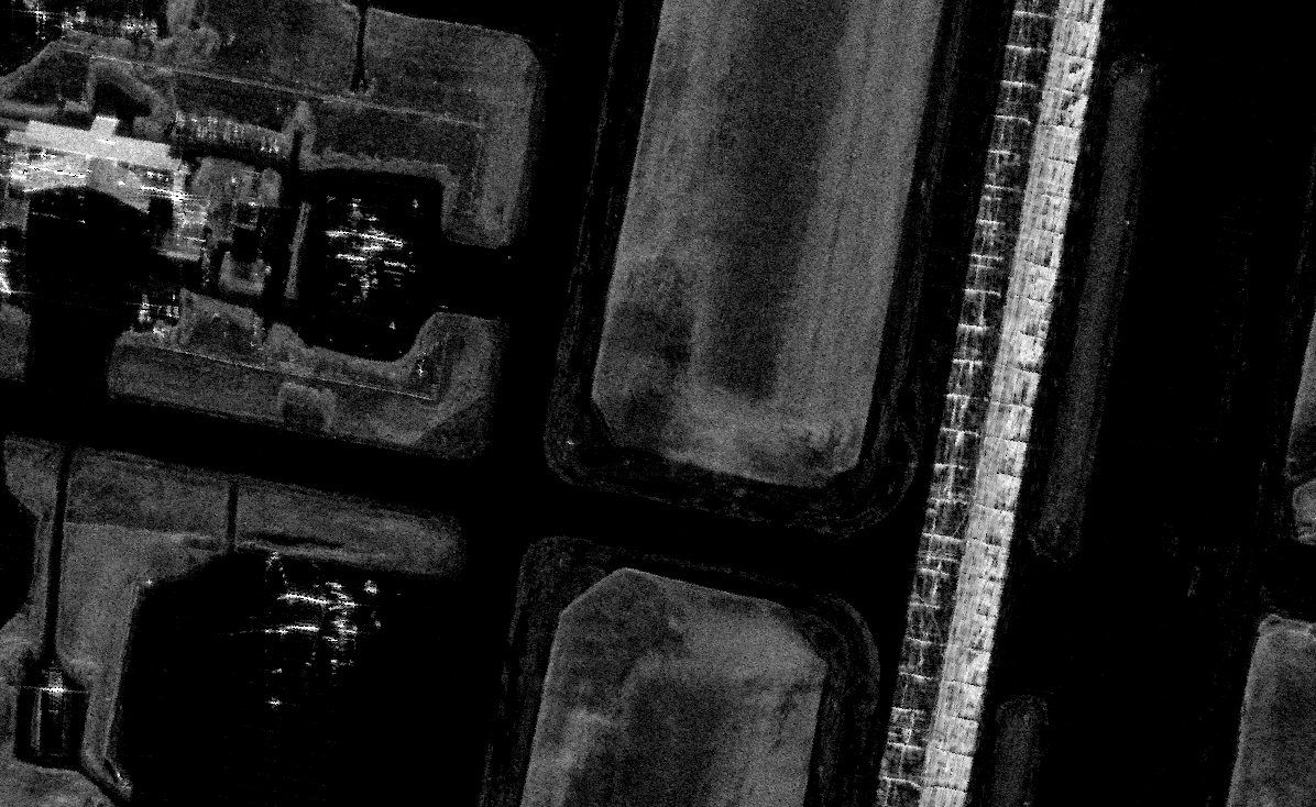 SAR image of Elmendorf at 8 looks; lowest speckle and highest clarity of runways, aprons, and facility edges.